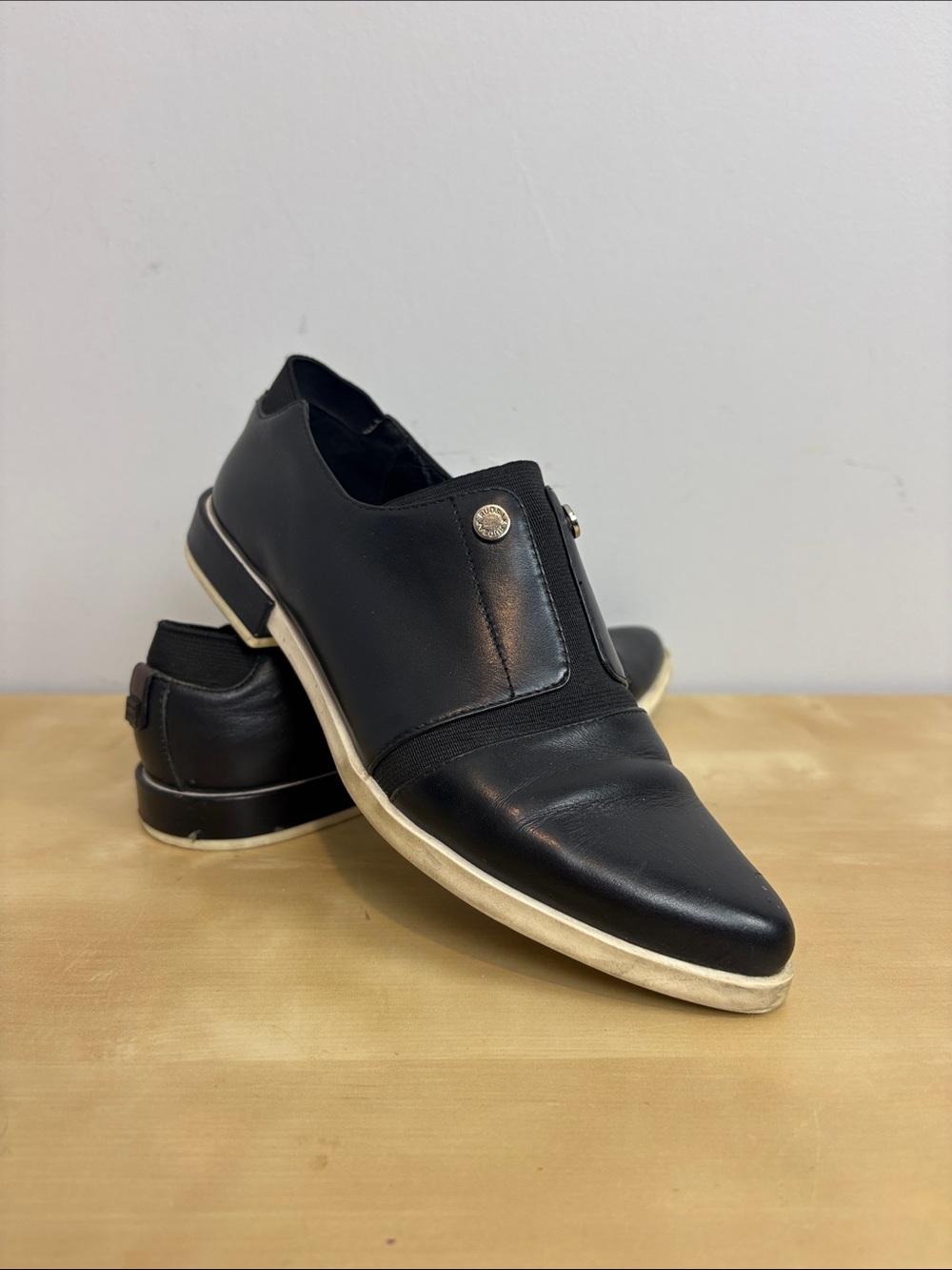 RUDSAK Black Leather Slip-On Loafers with Silver Stud Detail